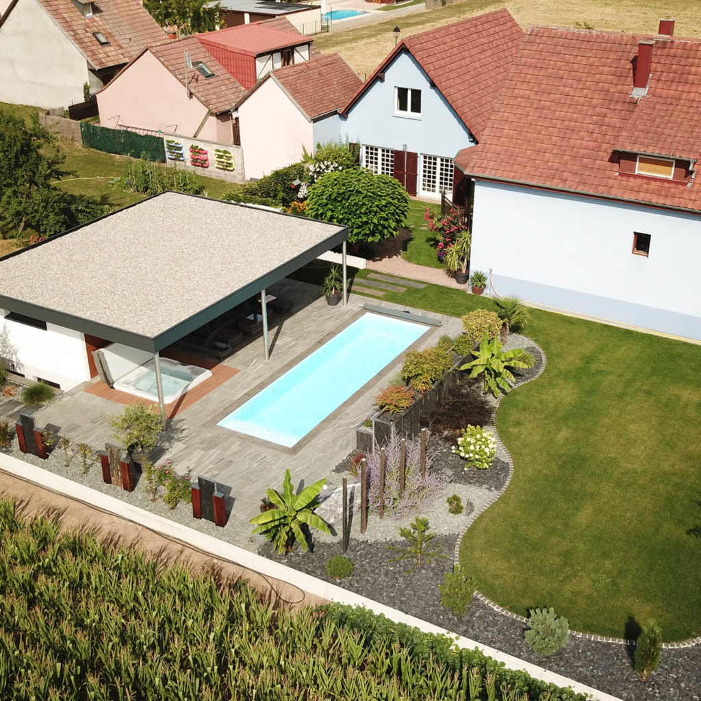 Rénovation piscine Meyenheim : Jacuzzi, terrasse agrandie et salon extérieur créé